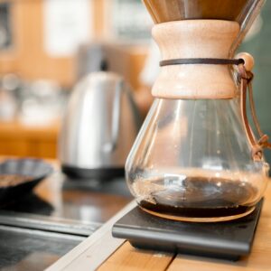 Handmade filtered coffee dripping into the pot